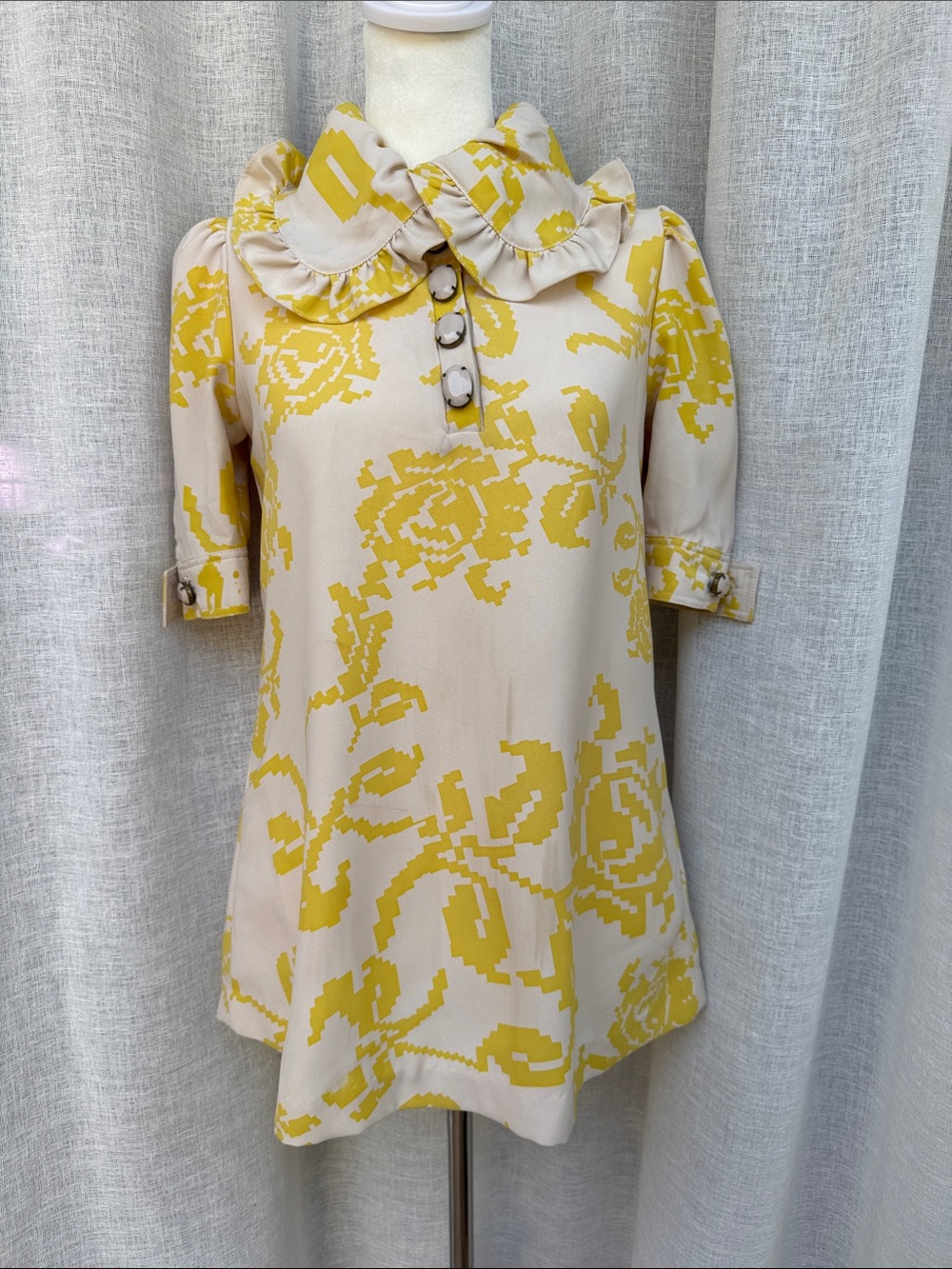 Karta yellow and beige floral print top ruffled collar and beaded button detaili